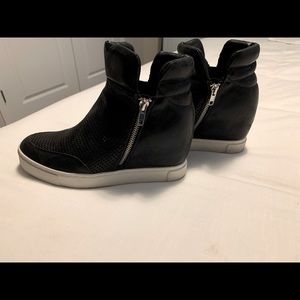 Steve Madden high wedge tennis shoe.